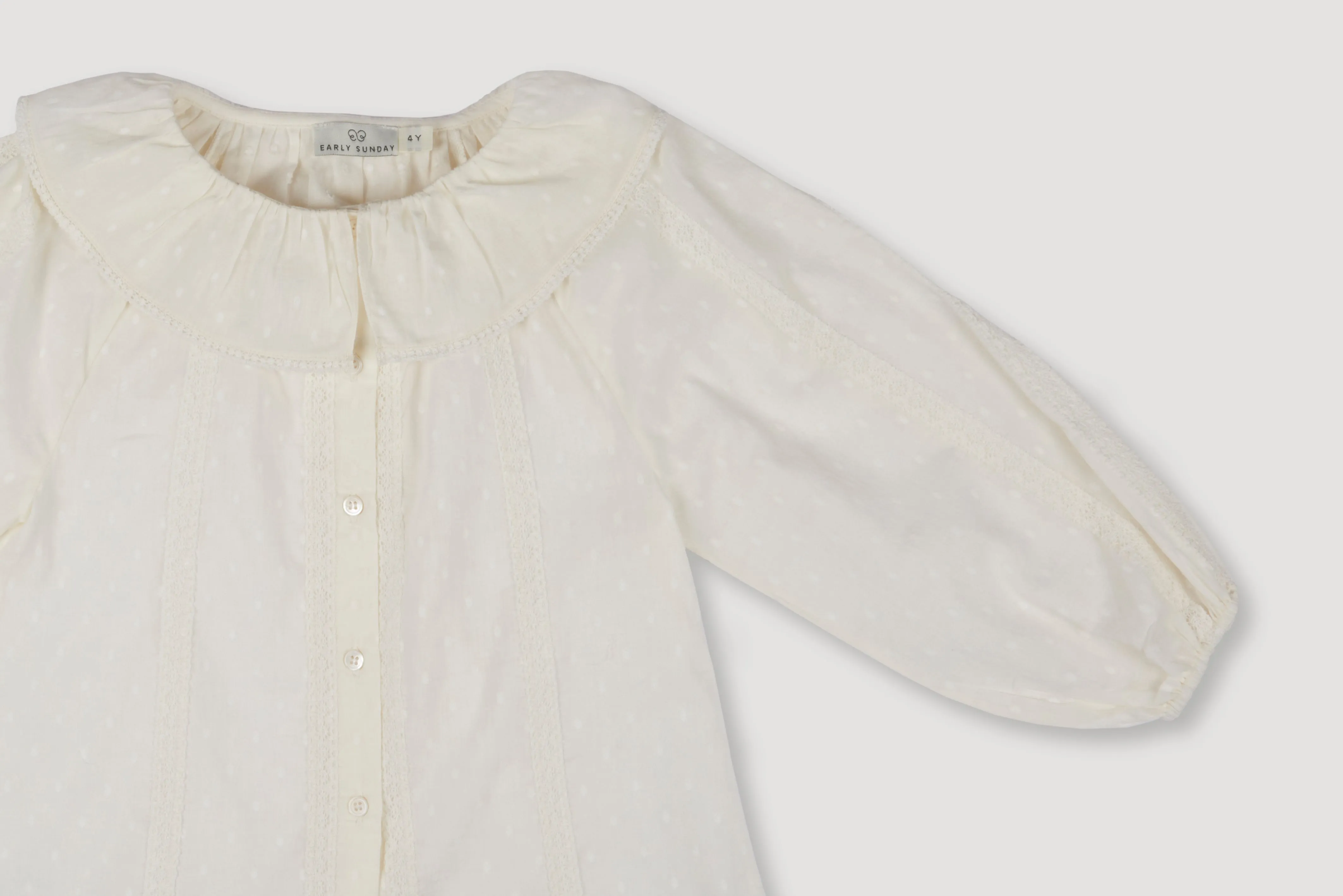 Ivory Celcia Blouse with Elegant Details