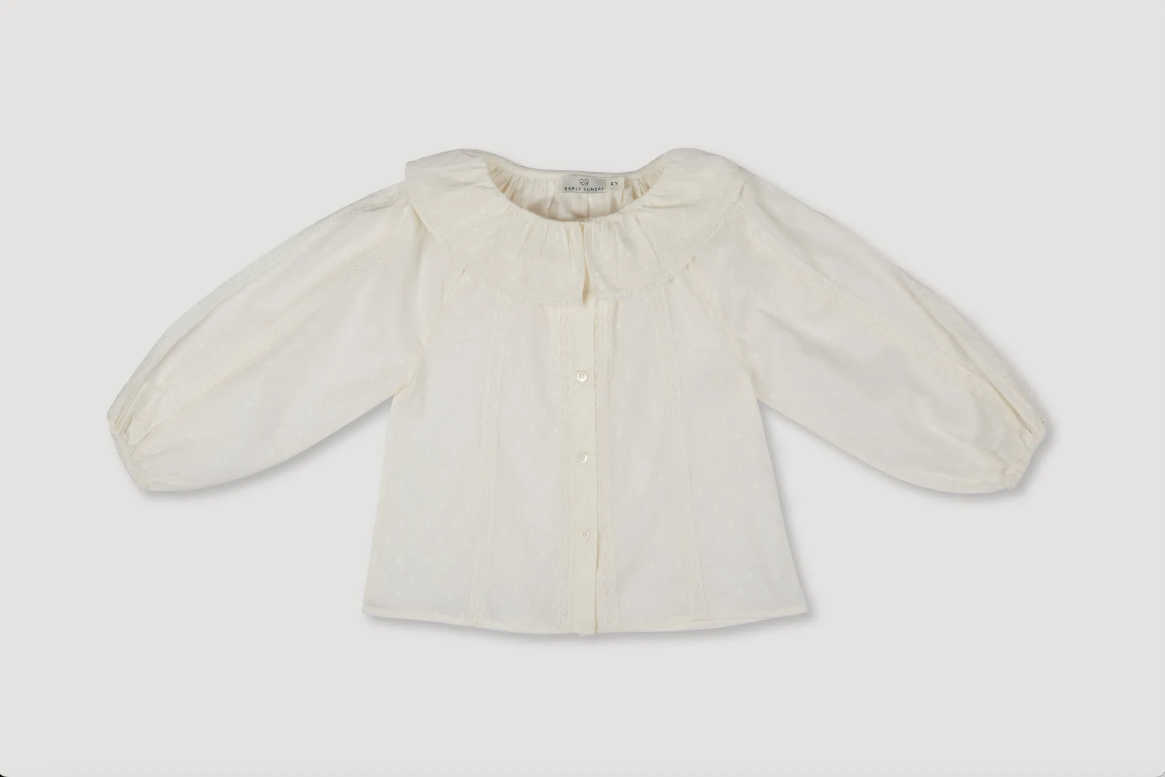 Ivory Celcia Blouse with Elegant Details