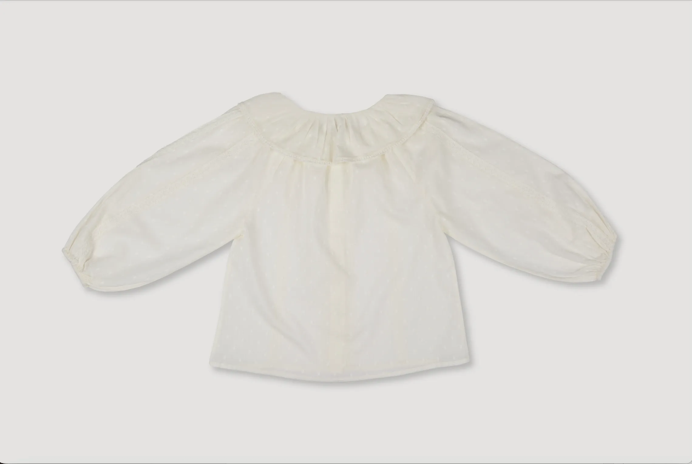 Ivory Celcia Blouse with Elegant Details