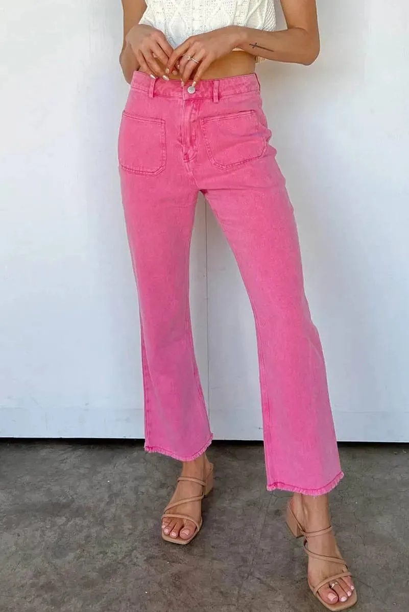 Get Your Fashion Fix: Pink Flare Leg Jeans with Raw Hem