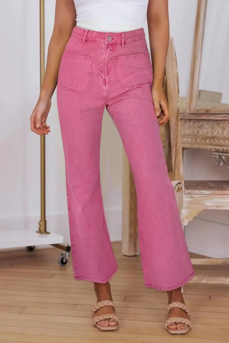 Get Your Fashion Fix: Pink Flare Leg Jeans with Raw Hem