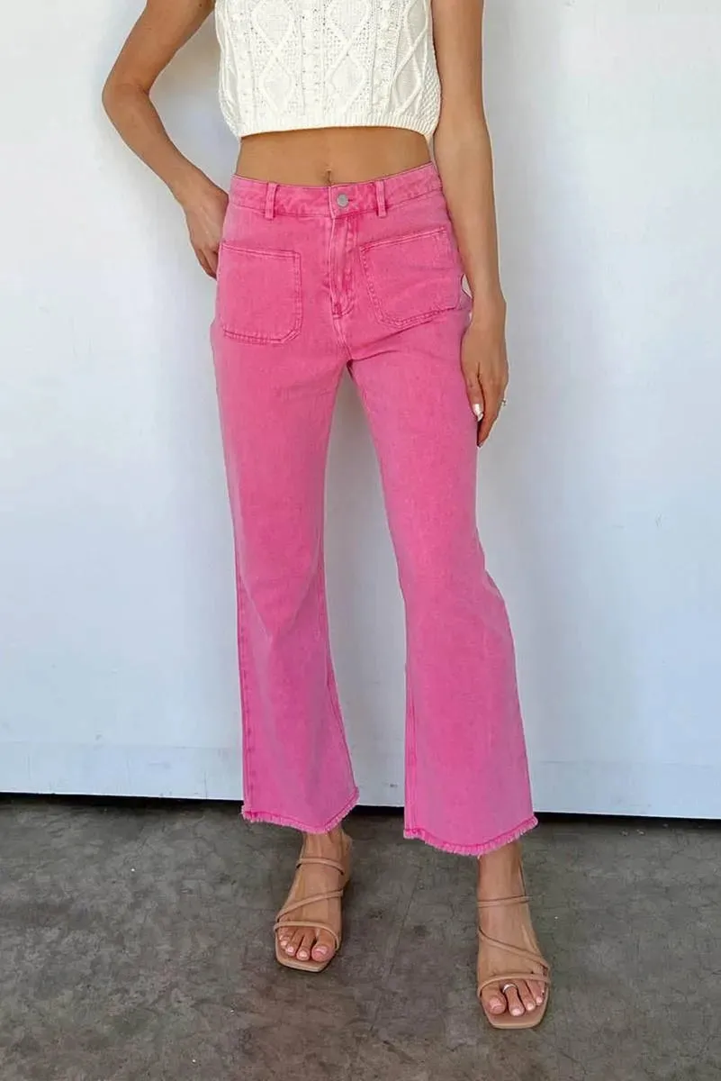 Get Your Fashion Fix: Pink Flare Leg Jeans with Raw Hem